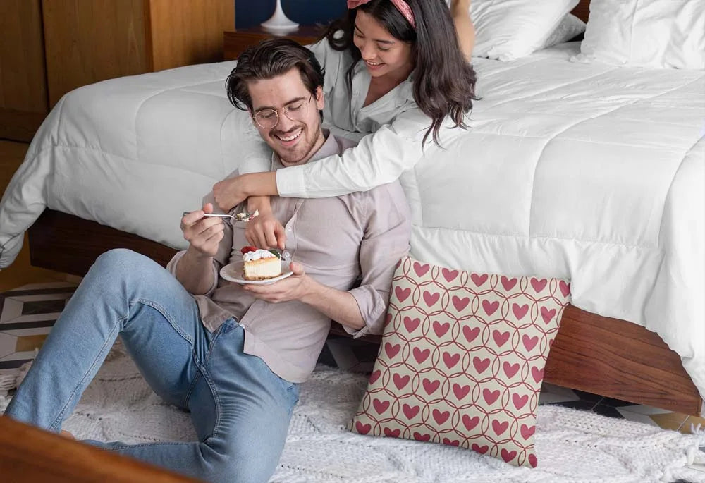 pillow-mockup-of-a-couple-eating-a-pie-in-the-bedroom-29018