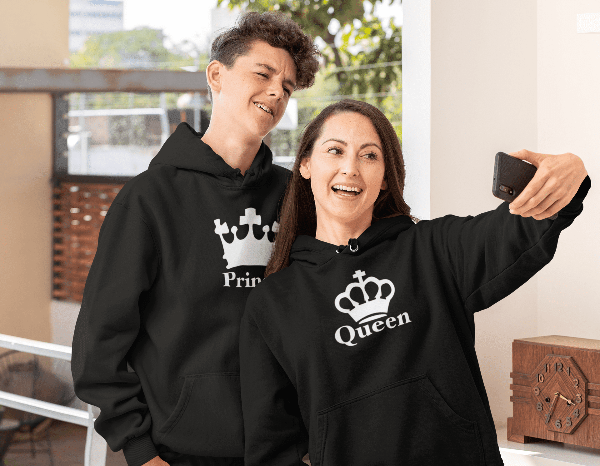 pullover-hoodie-mockup-of-a-mom-and-her-son-taking-a-selfie-31431.png