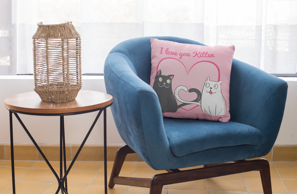 square-pillow-mockup-featuring-a-blue-single-sofa-29011