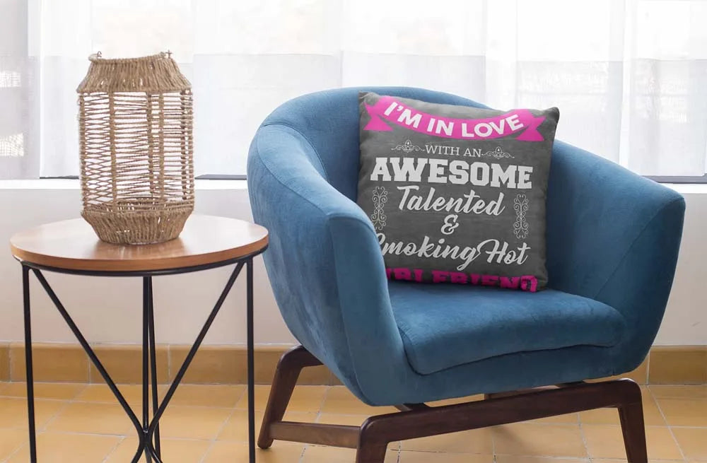 square-pillow-mockup-featuring-a-blue-single-sofa-29011