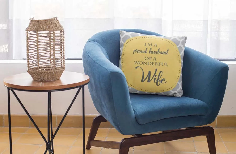 square-pillow-mockup-featuring-a-blue-single-sofa-29011