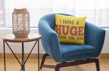 square-pillow-mockup-featuring-a-blue-single-sofa-29011