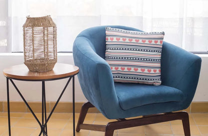 square-pillow-mockup-featuring-a-blue-single-sofa-29011