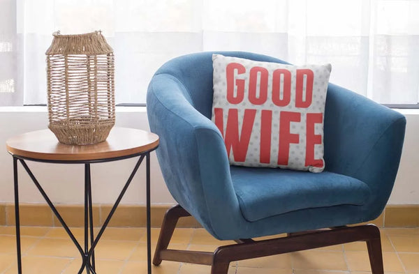 square-pillow-mockup-featuring-a-blue-single-sofa-29011
