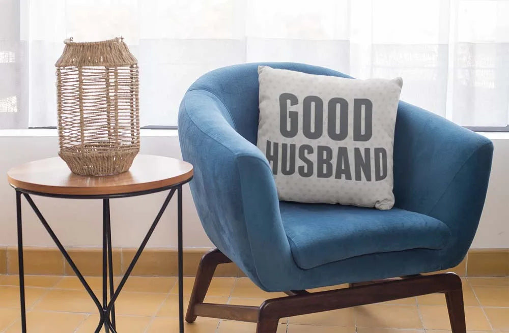 square-pillow-mockup-featuring-a-blue-single-sofa-29011