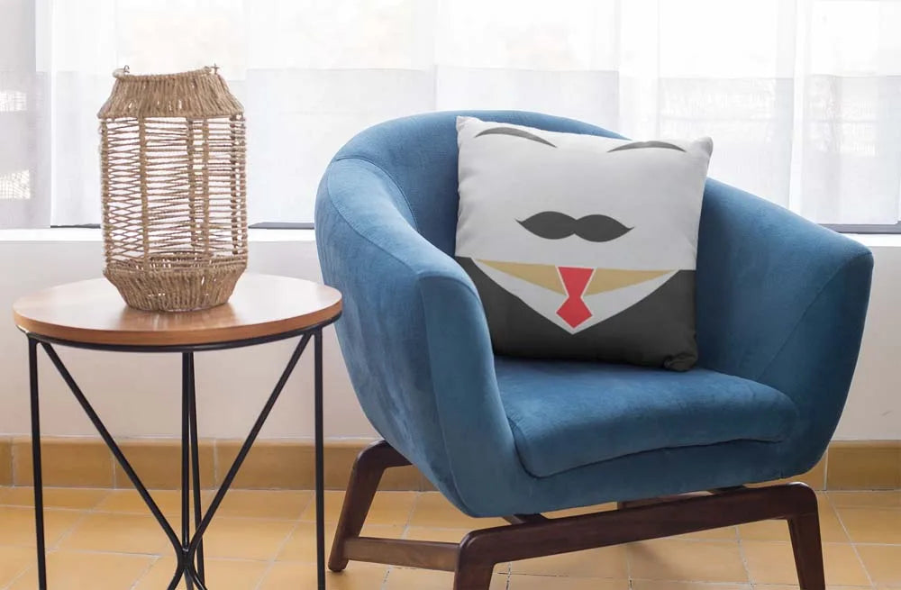 square-pillow-mockup-featuring-a-blue-single-sofa-29011