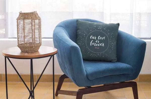 square-pillow-mockup-featuring-a-blue-single-sofa-29011