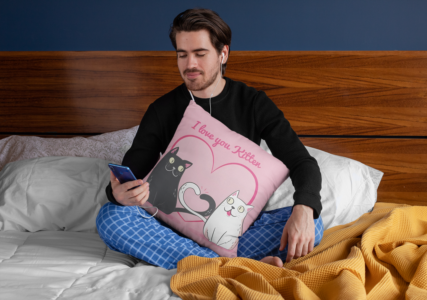 squared-pillow-mockup-featuring-a-man-sitting-over-a-bed-29023