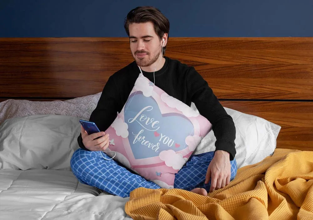 squared-pillow-mockup-featuring-a-man-sitting-over-a-bed-29023