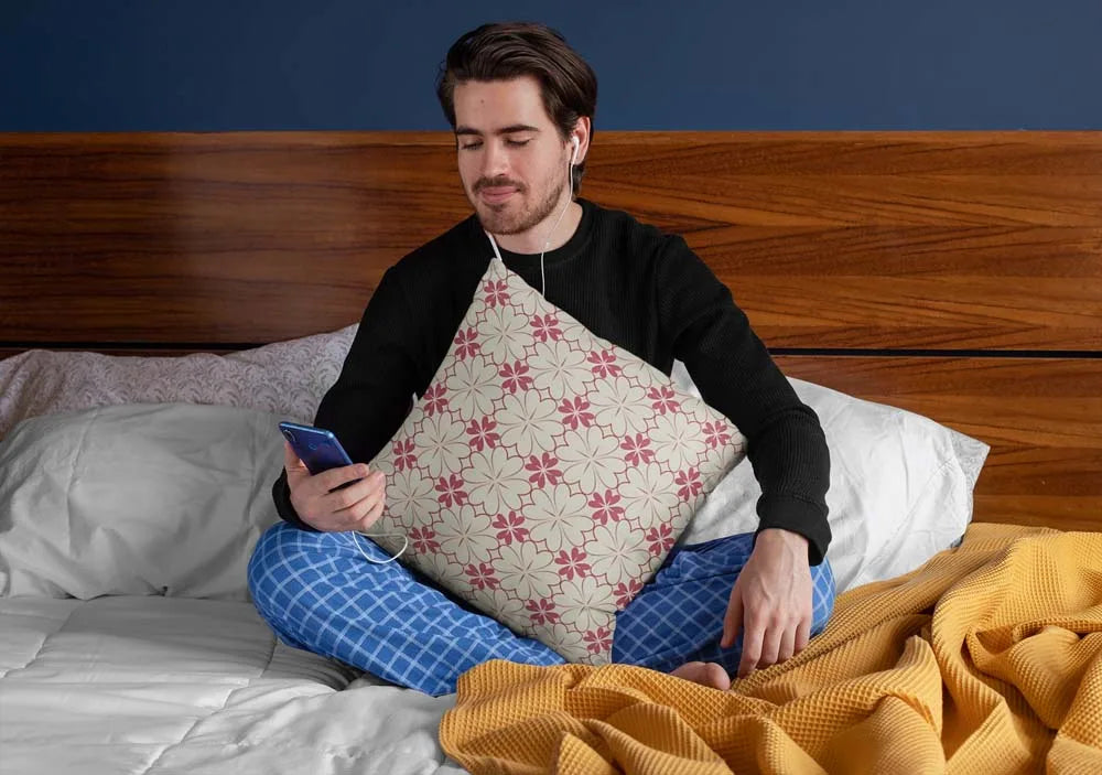 squared-pillow-mockup-featuring-a-man-sitting-over-a-bed-29023