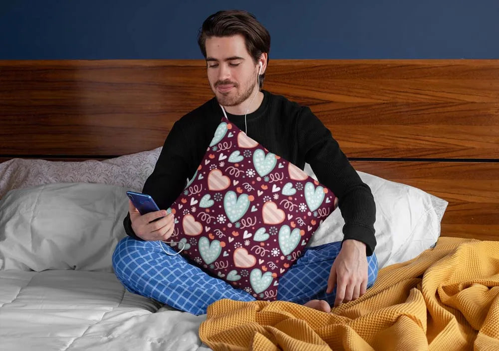 squared-pillow-mockup-featuring-a-man-sitting-over-a-bed-29023