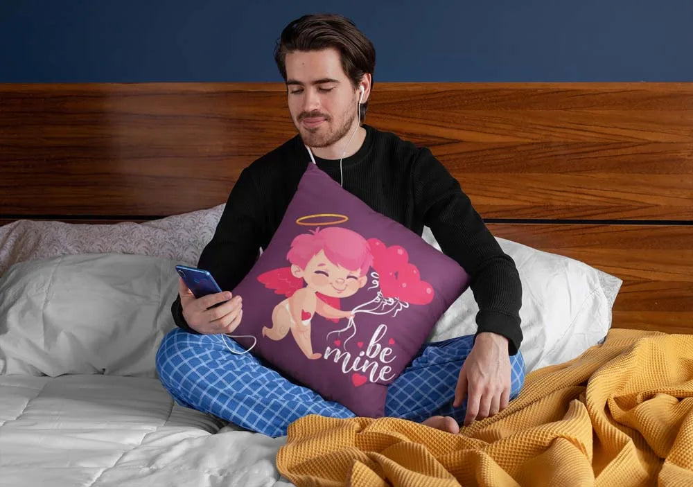 squared-pillow-mockup-featuring-a-man-sitting-over-a-bed-29023
