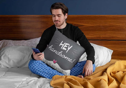 squared-pillow-mockup-featuring-a-man-sitting-over-a-bed-29023