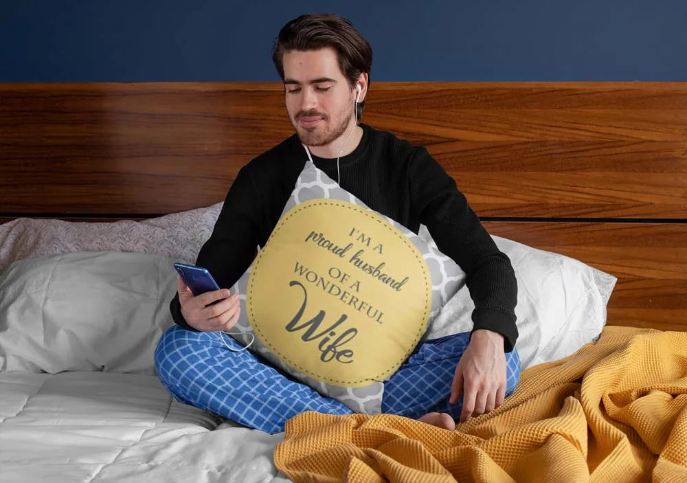 squared-pillow-mockup-featuring-a-man-sitting-over-a-bed-29023