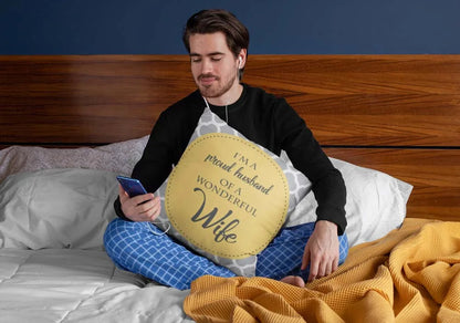 squared-pillow-mockup-featuring-a-man-sitting-over-a-bed-29023