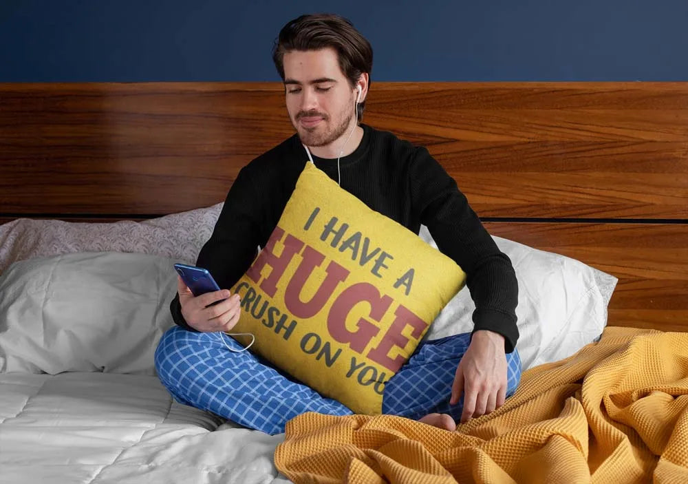 squared-pillow-mockup-featuring-a-man-sitting-over-a-bed-29023