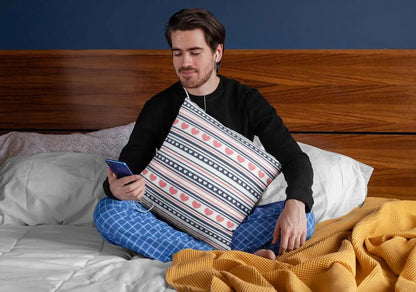 squared-pillow-mockup-featuring-a-man-sitting-over-a-bed-29023
