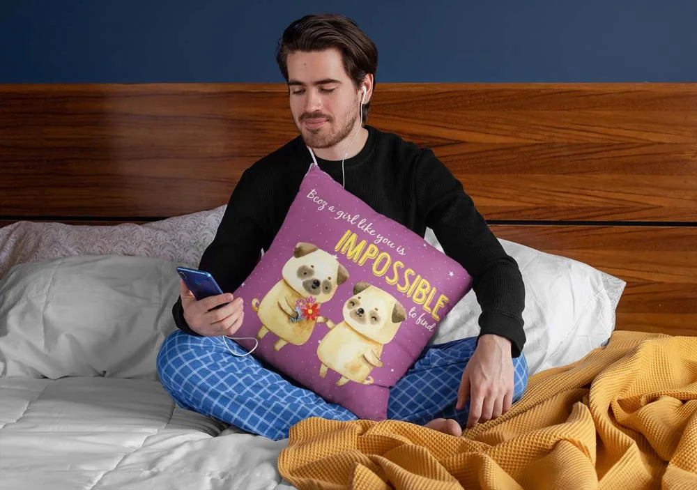 squared-pillow-mockup-featuring-a-man-sitting-over-a-bed-29023