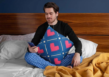 squared-pillow-mockup-featuring-a-man-sitting-over-a-bed-29023