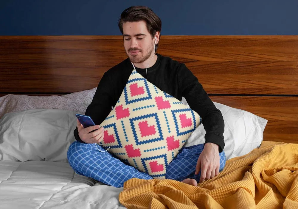 squared-pillow-mockup-featuring-a-man-sitting-over-a-bed-29023