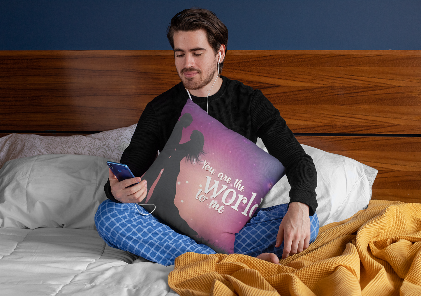 squared-pillow-mockup-featuring-a-man-sitting-over-a-bed-29023