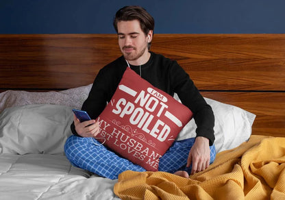 squared-pillow-mockup-featuring-a-man-sitting-over-a-bed-29023