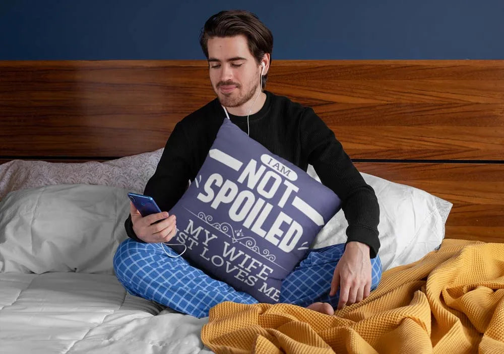 squared-pillow-mockup-featuring-a-man-sitting-over-a-bed-29023