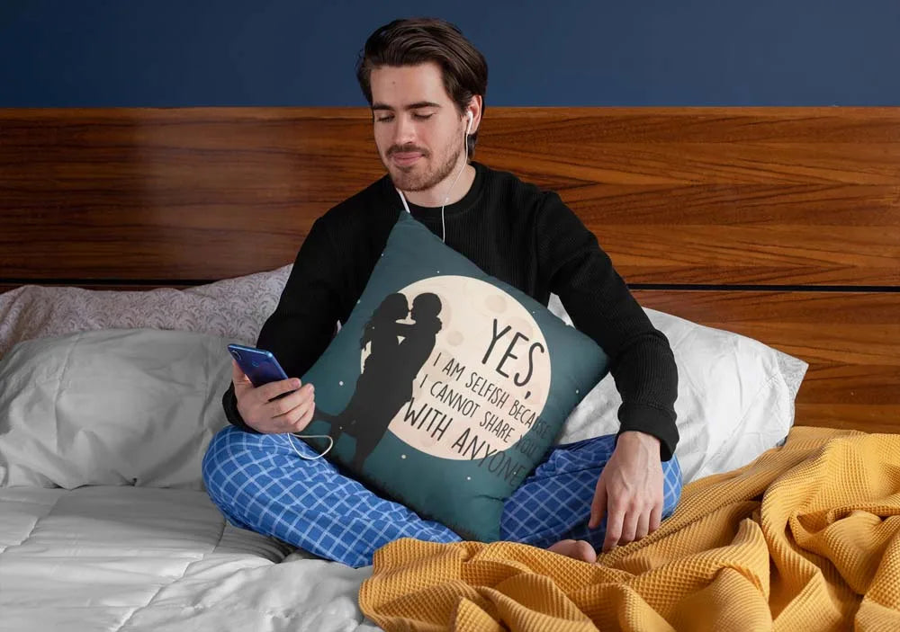squared-pillow-mockup-featuring-a-man-sitting-over-a-bed-29023