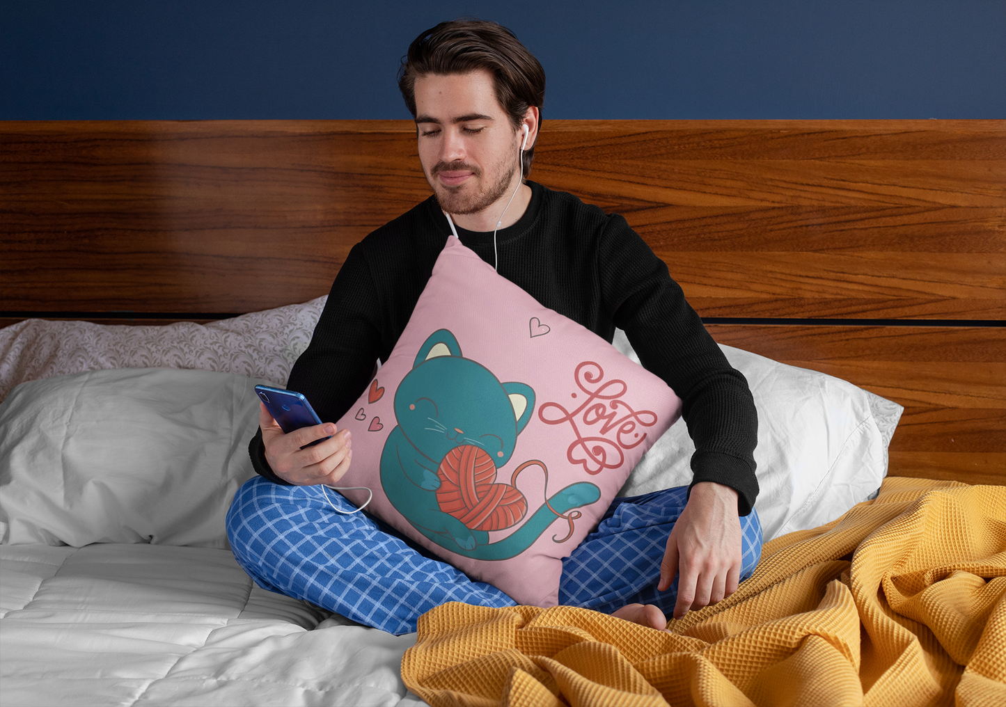 squared-pillow-mockup-featuring-a-man-sitting-over-a-bed-29023