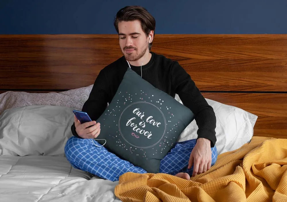 squared-pillow-mockup-featuring-a-man-sitting-over-a-bed-29023