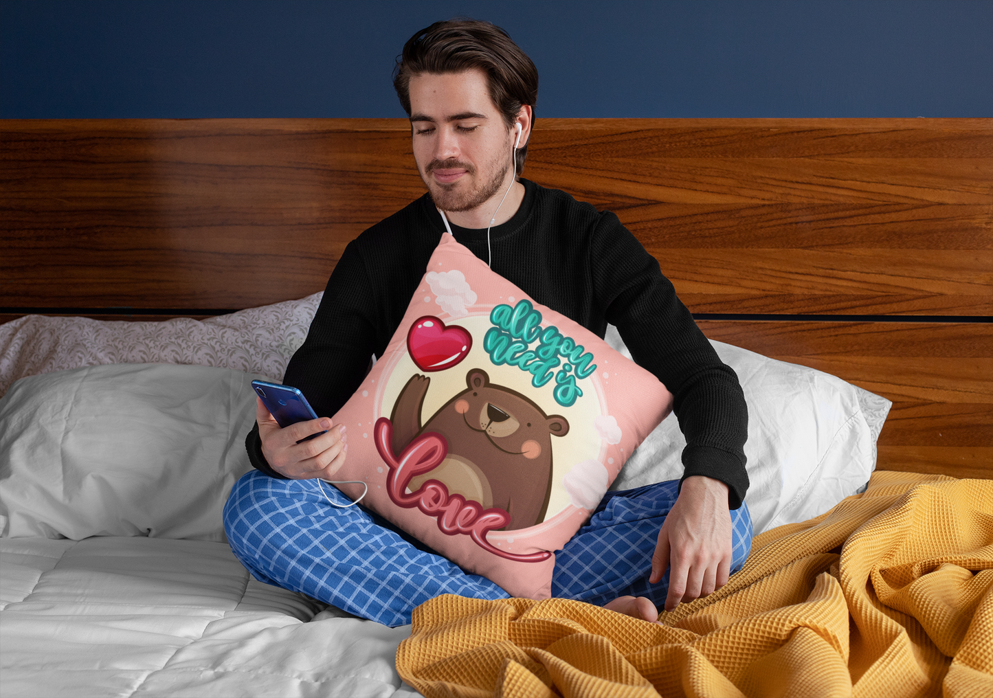 squared-pillow-mockup-featuring-a-man-sitting-over-a-bed-29023
