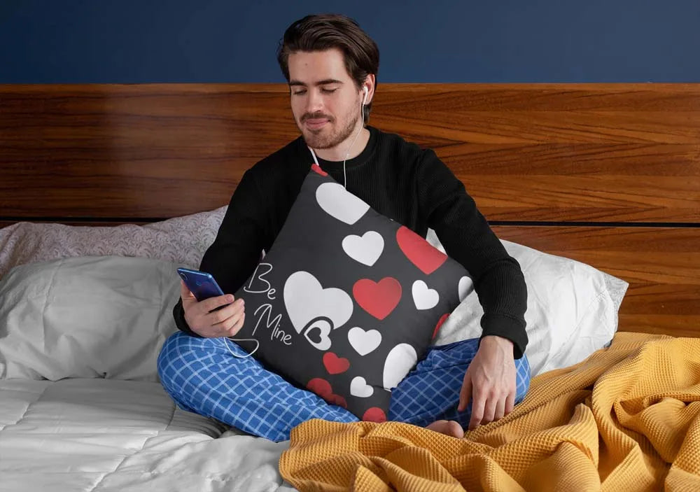squared-pillow-mockup-featuring-a-man-sitting-over-a-bed-29023_1