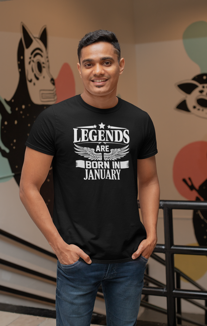 t-shirt-mockup-of-a-man-standing-by-a-wall-with-paintings-28960