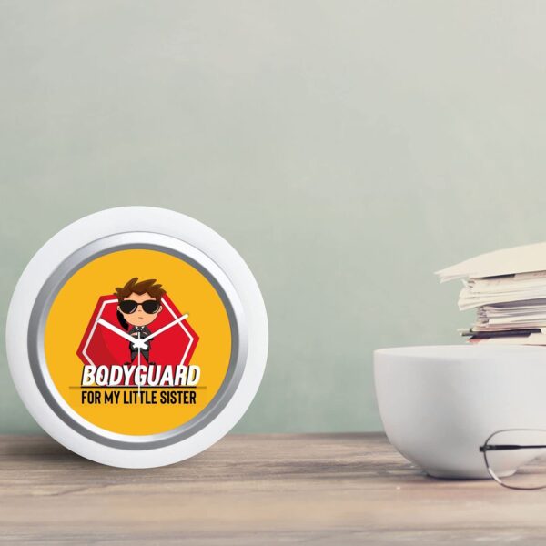 TheYaYaCafe Rakhi Gifts for Brother 6x6 Inches Round Desk Clock (White Frame, Unbreakable Flexiglass Cover, Analog) Bodyguard