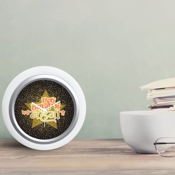 TheYaYaCafe Rakhi Gifts for Sister 6x6 Inches Round Desk Clock (White Frame, Unbreakable Flexiglass Cover, Analog) Ek Hazaron