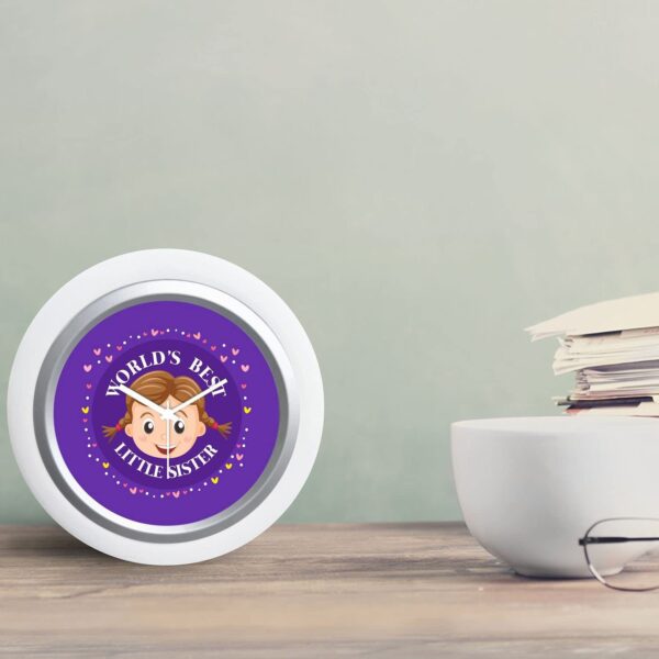 TheYaYaCafe Rakhi Gifts for Sister 6x6 Inches Round Desk Clock (White Frame, Unbreakable Flexiglass Cover, Analog) World's Best