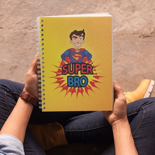 YaYa cafe Rakhi Combo for Brother - Cadbury Celebrations Assorted Chocolate Pack - 186.6g with Coolest Bro Printed Wirebound A5