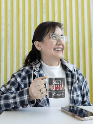 11-oz-coffee-mug-mockup-featuring-a-middle-aged-woman-with-glasses-m24751-2-1