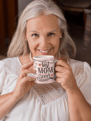 11-oz-coffee-mug-mockup-featuring-a-smiling-senior-woman-27450-1-1