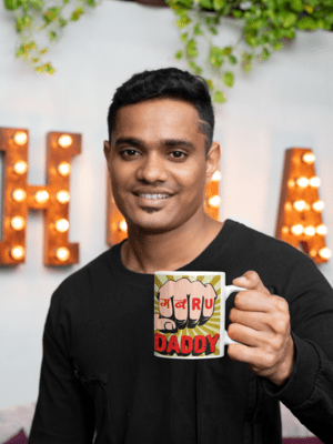 11-oz-coffee-mug-mockup-of-a-young-smiling-man-in-front-of-a-marquee-sign-28967-7-1