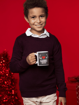 11-oz-mug-mockup-featuring-a-happy-kid-posing-by-a-christmas-gift-m18349-3-1