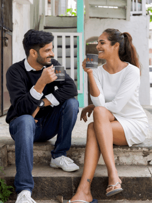 11-oz-mug-mockup-of-a-couple-having-a-coffee-outside-their-house-m26340-1