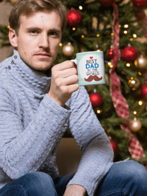 11-oz-mug-mockup-of-a-man-having-a-coffee-by-a-christmas-tree-30176-2-1