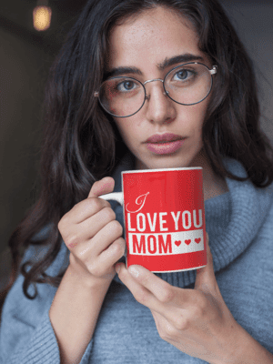 coffee-mug-mockup-featuring-a-woman-with-round-glasses-22435-3-1