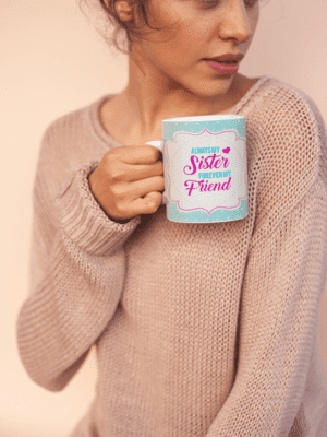 coffee-mug-mockup-held-by-a-woman-wearing-a-cozy-sweater-22441-4-1