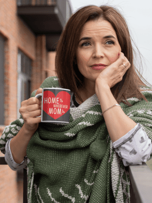 mockup-of-a-middle-aged-woman-holding-an-11-oz-coffee-mug-outside-31600-10