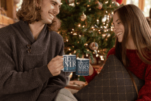 mug-mockup-of-a-couple-drinking-hot-cocoa-in-christmas-23519-1