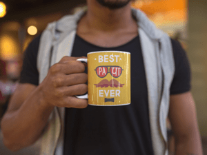 young-man-holding-a-coffee-mug-mockup-a12299-1