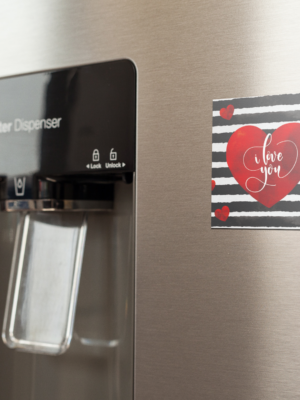 fridge-magnet-mockup-on-a-metallic-fridge-near-the-water-dispenser-a14790