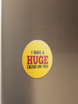 fridge-magnet-mockup-on-a-metallic-fridge-door-a14799